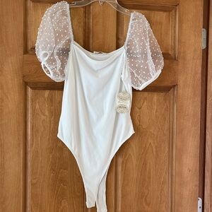 Brand new women’s bodysuit from Altard State.